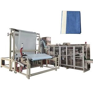 [Hot Item] Medical Bed Sheet Folding Machine Disposable Surgical Drape Making Machine with Side Adhesive