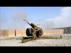 US Troops train Afghan National Army in the use artillery