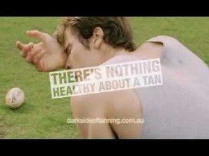 Dark Side of Tanning - boy playing footy