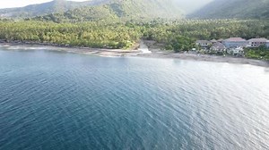 Aerial View of Tropical Beach and Turquoise Ocean