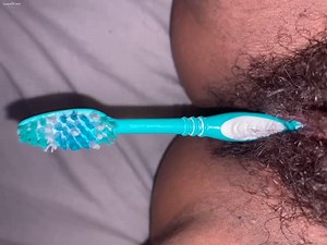 Insert toothbrush in that tight hairy pussy