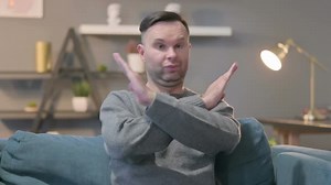 Portrait of Casual ManCrossing Arms As No Sign