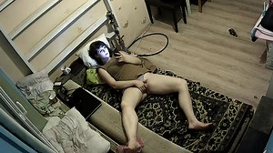 Hot MILF chilling on her couch exposed to ip camera