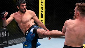 Beneil Dariush finishes Scott Holtzman with spinning back fist in UFC