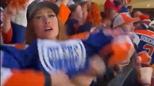 Shock moment fan flashes boobs in crowd during NHL match in moment of madness