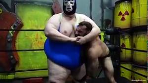 Fat guy smashes muscle guy