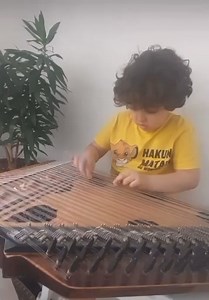 3.3K views · 137 reactions | Grandson of Shiv Kumar Sharma playing qanun | Waseem Altaf | Facebook