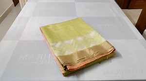 Light green colour matka silk Saree zig zag woven pink thread woven Pallu and Zari Border COST : 10500 INR ** Click on the link to Pay and buy ** https://rzp.io/l/69TvUyh | Vasthram Silk