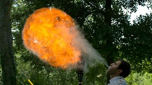 91K views · 1.5K reactions | Dan gets his mouth rather hot as he attempts to become a #firebreather, while Gav films the intense #slowmo action at 1,600fps. You really shouldn't try this at home... | The Slow Mo Guys | Facebook