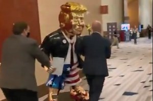 Huge gold Trump statue delights GOP conference crowds ahead of comeback speech