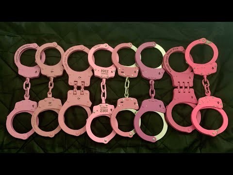 All pink handcuffs I own. Eight pink handcuffs. Breast cancer awareness month.