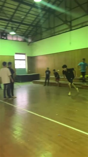 Acrobatic Moves in Indoor Gymnasium