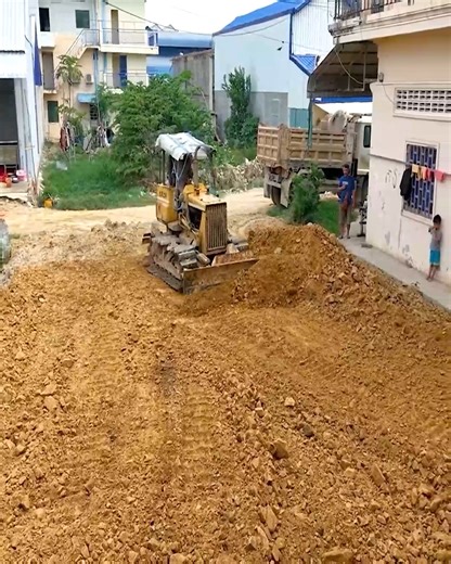 30 reactions | Nice Action!!! Komatsu D21P Bulldozer Operator Handles Village Land Filling Project With Dump Truck Delivering Soil | Bulldozer Operator | Facebook