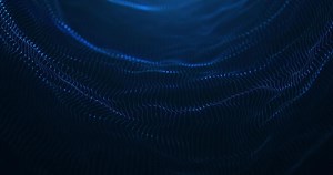 Digital particle wave on dark background, futuristic wave background, seamless loop