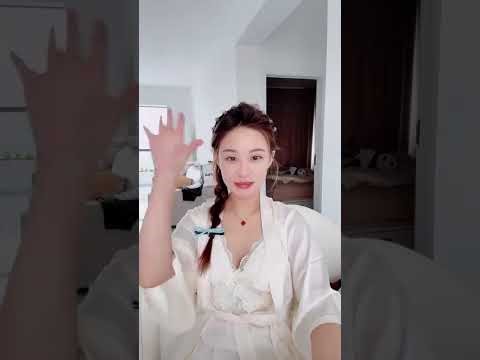 The beautiful woman's live stream featured her deep cleavage, showcasing proportions that were th...