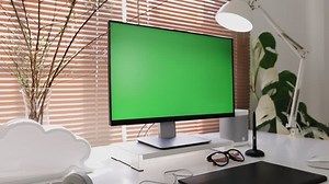 clip-1099510257-zoom-out-computer-display-monitor-green-screen