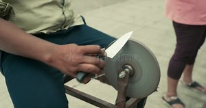 Man Sharpening Knife on Traditional Grinder Stock Video - Video of occupation, blade: 414427787