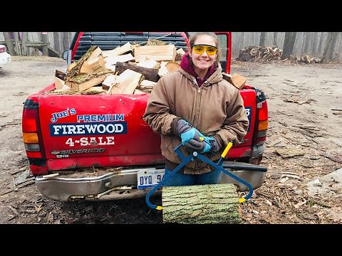 Teen girl demonstrates how to use “Pinch-A-Log” firewood moving tongs