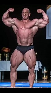 Monster Bodybuilder of The Week, Michal Krizo, A Real Muscle Machine. Today, we once again spotlight on the indomitable bodybuilder, Michal Krizo, who's muscularly built all round. This impressive bodybuilder has long shattered stereotypes and limitations, staying big like it's just so easy. His fitness journey is a testament to what's achievable with dedication and laser focus on your goals. This dude's massive physique has had him trending on every platform for years now. This video will not o