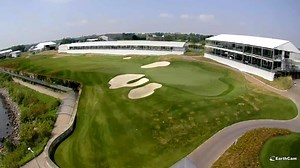 The build is nearly complete and the world's top players will arrive soon to compete for The Cup! This view is from the top corner of the clubhouse looking down onto the Presidents Cup 14th green. | Presidents Cup