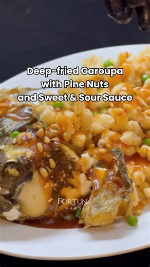1.8K views | Deep-fried and crispy Garoupa served with lightly toasted pine nuts, which add a delicious crunch and nutty flavors to the dish, covered with tangy sweet and sour sauce. | Fortuna Hotel Hanoi | Facebook