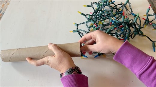 Wraps string lights around a paper towel tube...👀 | Hometalk