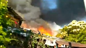 About 100 homes burned as massive fire rages in Mexican resort town