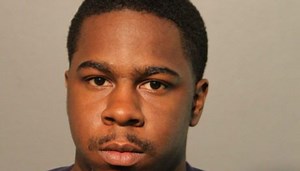 Man charged with robbing Logan Square cellphone store at gunpoint