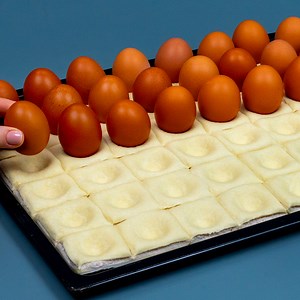 Ideal modeling with the egg! Brilliant puff pastry appetizer. Ingredients: puff pastry - 800 g (28.2 oz) cheese cream - 200 g (7 oz) ham - 150 g (5.3 oz) puff pastry - 800 g (28.2 oz) eggs - 3 pieces water - 700 ml (23.6 fl oz) BOIL FOR 7 minutes cheese cream - 150 g (5.3 oz) bell pepper, yellow - 100 g (3.5 oz) zucchini - 100 g (3.5 oz) mushrooms - 100 g (3.5 oz) potatoes - 100 g (3.5 oz) red onion - 100 g (3.5 oz) salt - 3 g (0.11 oz) Tray size 27 X 35 cm (11 in x 14 in) IN THE OVEN 200 °C (39