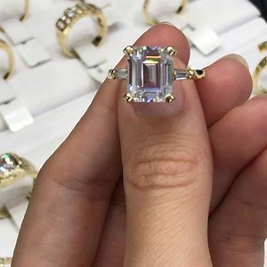 1K views · 81 reactions | C L E A N | & | L E A N Did you know the emerald cut became popular in the 1920s with the advent of Art Deco, a design movement which valued clean lines and symmetry? Secrets loves the elegant simplicity of this 10ct white gold split band emerald cut ring. Do you? >>>Discover more retro inspired designs in store and online #secretsshhh | Secrets | Facebook