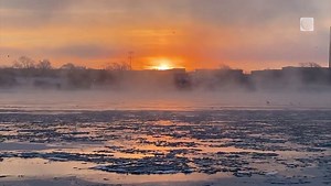 A beautiful sunset glows golden over the steam devils in the Upper Niagara River in Fort Erie, ON