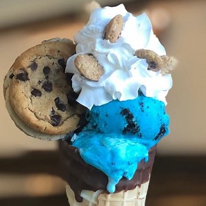 42K views · 279 reactions | The COOKIE MONSTER CONE! Cookie Monster ice cream in a chocolate dipped waffle cone topped with whipped cream, Cookie Crisp and an edible cookie dough cookie sandwich!!!  | The Yard Milkshake Bar | Facebook