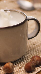 Quadratini Napolitaner wafers take a delightful splash into creamy milk, creating a heavenly treat. #Loacker #Quadratini #NapolitanerSplash | Loacker | Facebook