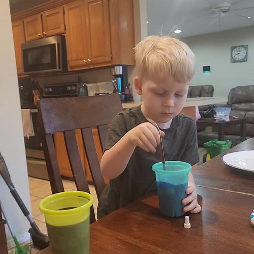 They coloring Easter egg. | Nicole Lynn Kennedy