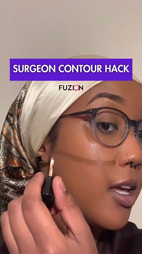 So, we’ve been contouring wrong this time! 😦 Ever wondered how surgeons sculpt facial features? Learn how to accentuate and redefine features using makeup, just as surgeons do with precision instruments. Are you going to try the Surgeon Contour Hack? 🎥 @anisaomo #fuzionmag #countouringmakeup #surgeonhack #facialfeatures #makeupcontouring | Fuzion Magazine