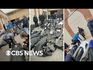 Videos show rows of body bags at Iranian medical center