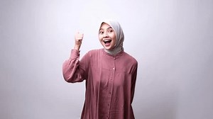 South East Asian Indonesian Hijab Girl Thumbs Up to Camera