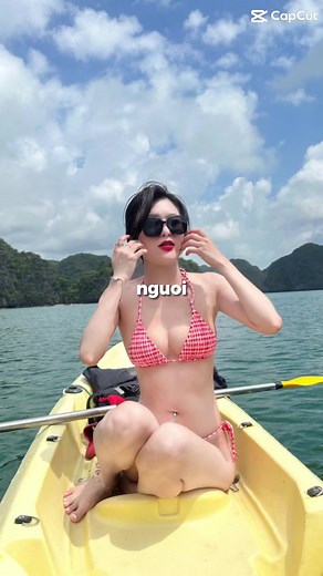 Scenic Kayaking Adventure in a Red Bikini