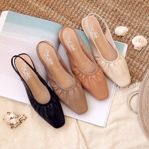 28 reactions | The Ruched Detail Slingback Flats will effortlessly...