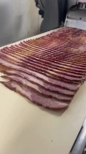 This is for all you bacon lovers 🐷🥓 #reels #pork #pig #bacon #makingbacon #slicingbacon #butcher #butchering #thebeardedbutchers | The Bearded Butchers