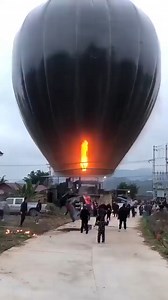 Black Hot-Air Balloon | Sports Pratidin