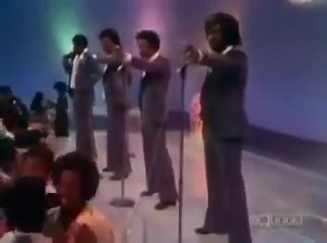 The Manhattans - '' Kiss and Say Goodbye '' - 1976 "Kiss and Say Goodbye" is a 1976 song by American R&B vocal group The Manhattans. It was written by group member Winfred Lovett, the bass singer and songwriter of the group, who intoned the famous spoken voice of the song's intro. The song was recorded for the album The Manhattans, released in 1976 by Columbia Records, and was released as a single in March of the same year. "Kiss and Say Goodbye" became a worldwide success, appearing in the musi