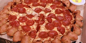 Pizza Hut's new hot dog stuffed crust pizza is a 'horrible tragedy'