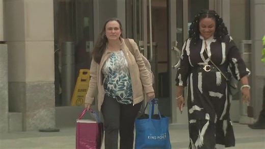 Workers laid off from USAID seen collecting belongings from office