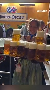 🍻 The women at Oktoberfest are on another level of strength and balance. | The Ring