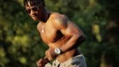 Muscular black african man workout exercising in a park