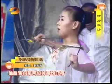 Chinese girl swallows steel ball and 5 swords