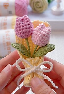 307K views · 4.2K reactions | Learn how to crochet a cute tulip bouquet in minutes! Perfect for beginners or as a handmade gift. This easy tutorial covers the flower, leaf, and ribbon assembly step by step. Make your own charming tulip bouquet today! #CrochetTulip #BeginnerCrochet #CrochetBouquet #DIYFlowers #HandmadeGift | Jonalyn B. Mangunay | Facebook