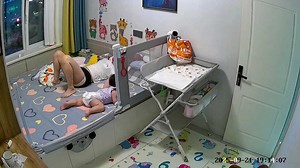 Mum saves baby falling off bed thanks to superhuman reactions