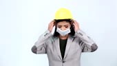 Dark Tan Skin Office Woman in Gray Suit wear Yellow Safety Hard Hat...